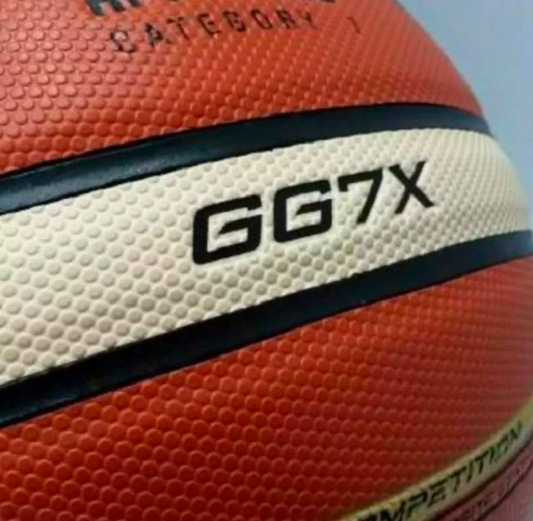 Official size basketball with textured surface for better grip, suitable for outdoor courts and indoor practice sessions