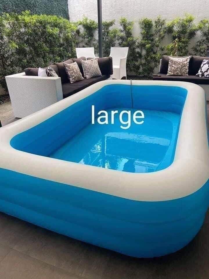 Large inflatable swimming pool for adults and kids, blue rectangular family size design with thick 3 layer material