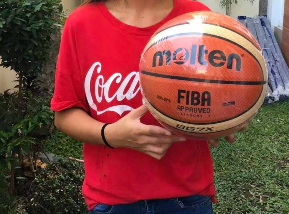 Game ready basketball with durable rubber surface, designed for indoor courts and outdoor play with reliable grip control