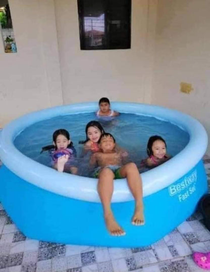 Round pool with portable inflatable structure, designed for outdoor family use with durable and spacious layout