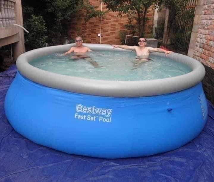 Portable inflatable pool with round shape, family friendly design for outdoor use and easy backyard setup
