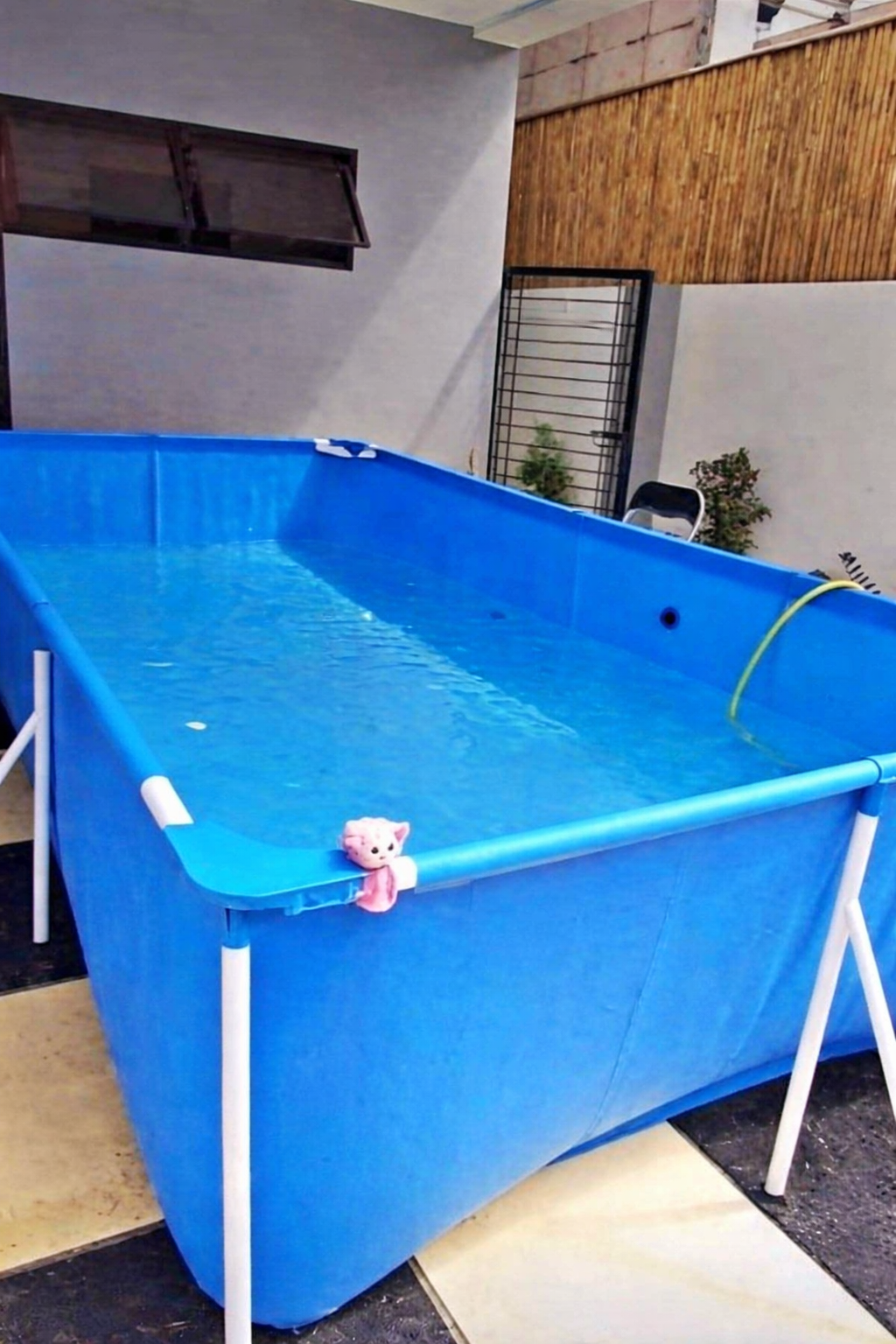 Rectangular portable pool for outdoor family use, durable frame design with easy setup for backyard water fun