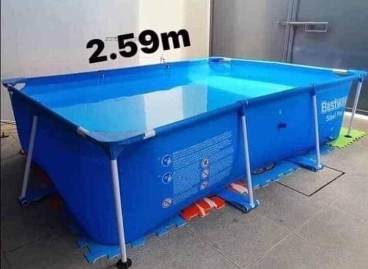 Portable swimming pool with spacious design, ideal for backyard setup and family outdoor water fun